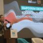 Wakil Gubernur Aceh H.Fadhlullah, SE memberi sambutan saat membuka Simposium Ekonomi Kolaborasi BSI dan PWI dalam Mendukung Perkembangan UMKM di Aceh, di Aula Landmark BSI, Kamis (24/4/2025).