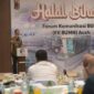 Plt. Sekda Aceh, M.Nasir menyampaikan sambutan pada halal bihalal FK BUMN Aceh di gedung Landmark BSI Aceh, Kamis (10/4/2025).