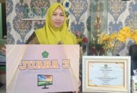 Kepala Madrasah Ibtidaiyah Negeri (MIN) 8 Aceh Besar, Nuraina, S.Pd.I, M.Pd