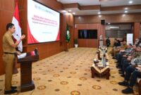 Plt. Sekda Aceh, M. Nasir, S.IP, MPA membuka kegiatan sosialisasi waspada aktivitas keuangan ilegal yang digelar OJK Aceh, di Gedung Serbaguna Kantor Gubernur Aceh, Selasa, (8/7/2025).
